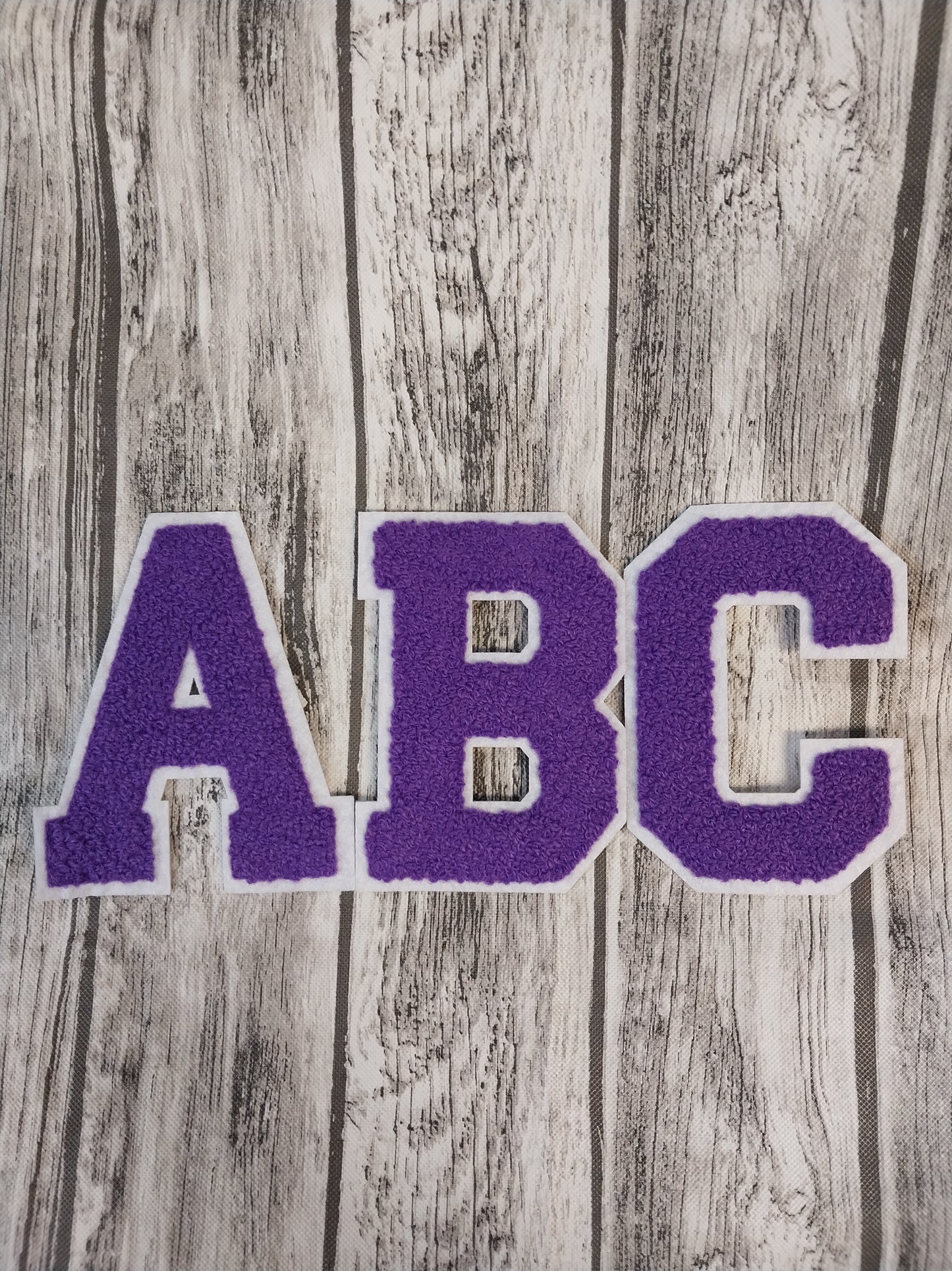Chenille Letter Patch -3.75" X 2.5"W Purple W/White Trim