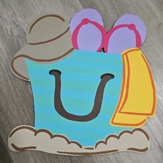 Beach bag in the sand