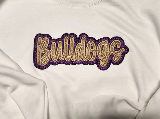 "Bulldogs" Old Gold Glitter Offset in Eggplant Glitter Embroidered Sweatshirt Double Layer Glitter Script